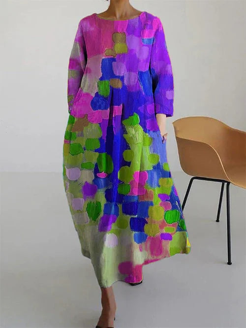 Elegant colorful long sleeve maxi dress for women, featuring a flowing vibrant design perfect for summer style.