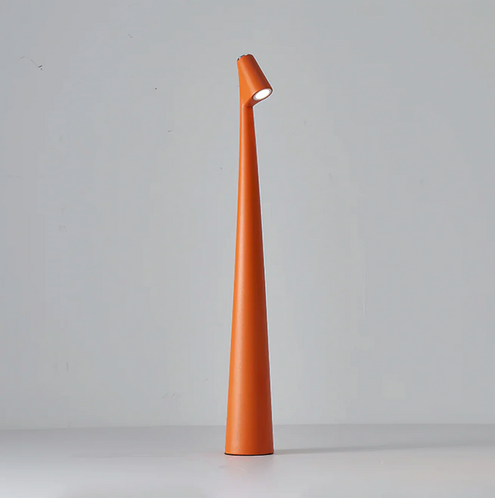 Dimmable cordless LED lamp, ideal for home office or bedroom, providing soothing ambient light.