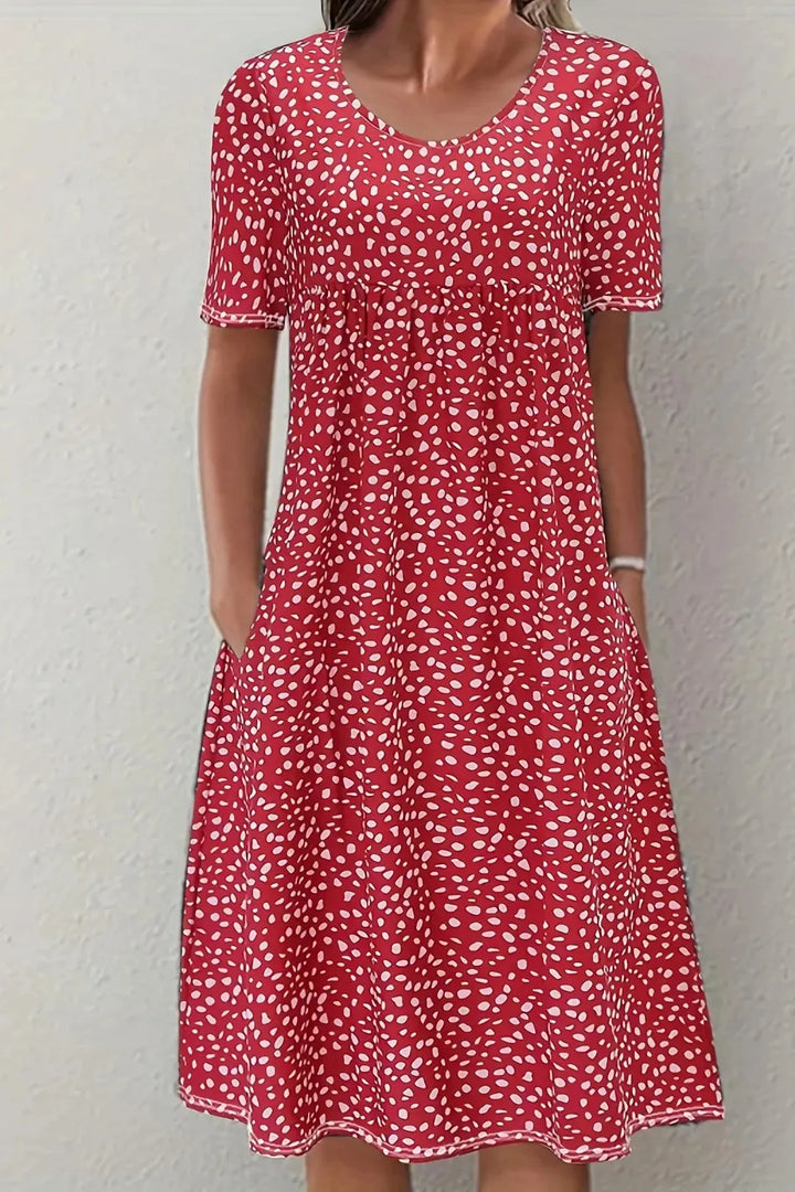 Chic women's Ella pleated waist midi dress, a sophisticated and elegant choice for any special occasion.