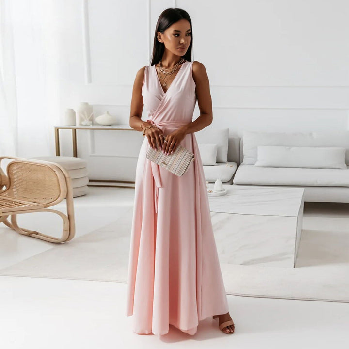 Elegant faux wrap maxi dress in deep burgundy, perfect for wedding guests & formal events.