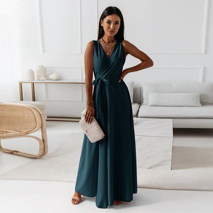 Women's formal deep green faux wrap maxi dress with long sleeves, ideal for evening wear.