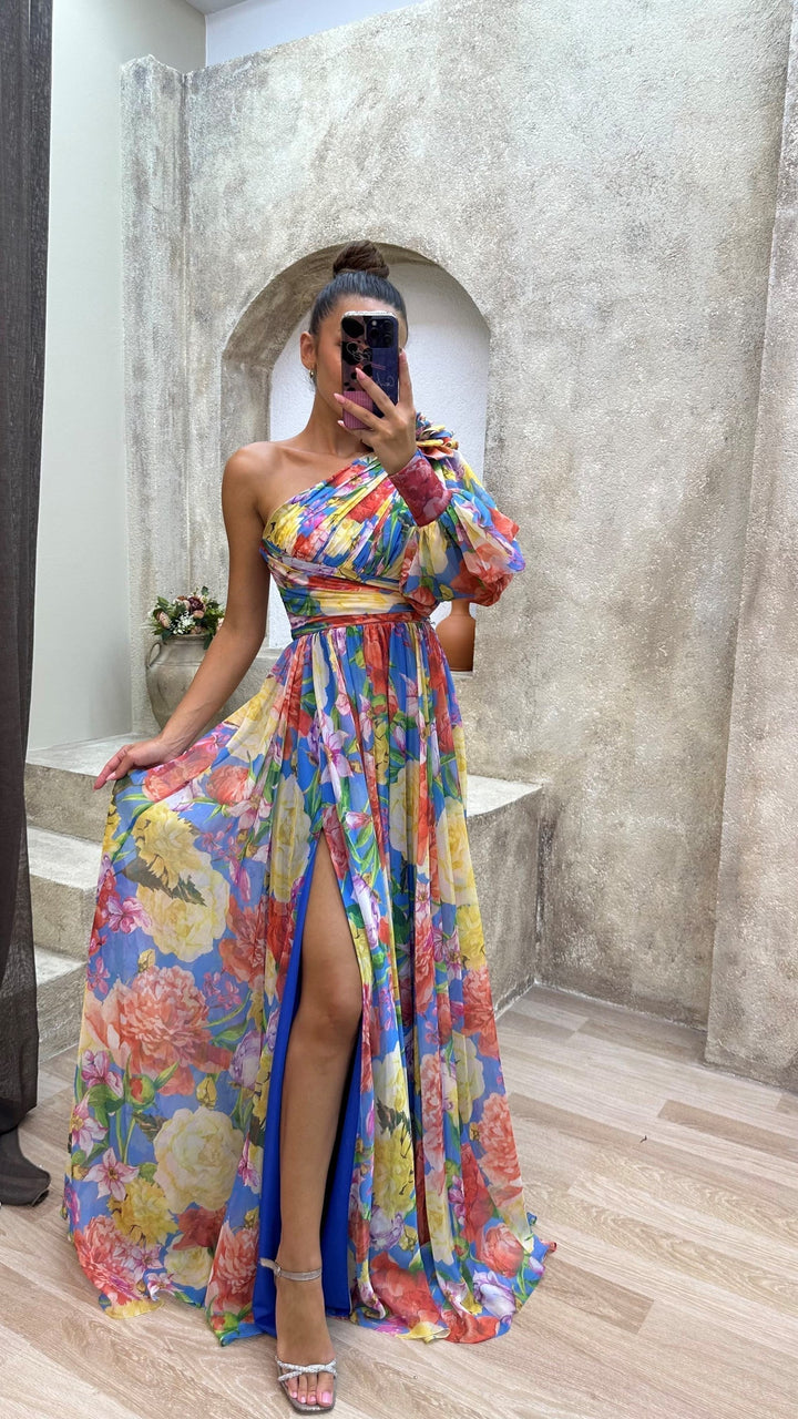 Stylish women's floral print maxi dress featuring a graceful slit, suitable for elegant spring wear