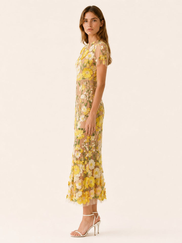Women's elegant floral midi dress with round neck & short sleeves, ideal for formal events.