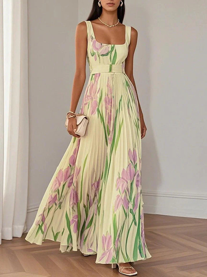 Beautiful floral pleated maxi dress with a square neck, ideal for wedding guests.