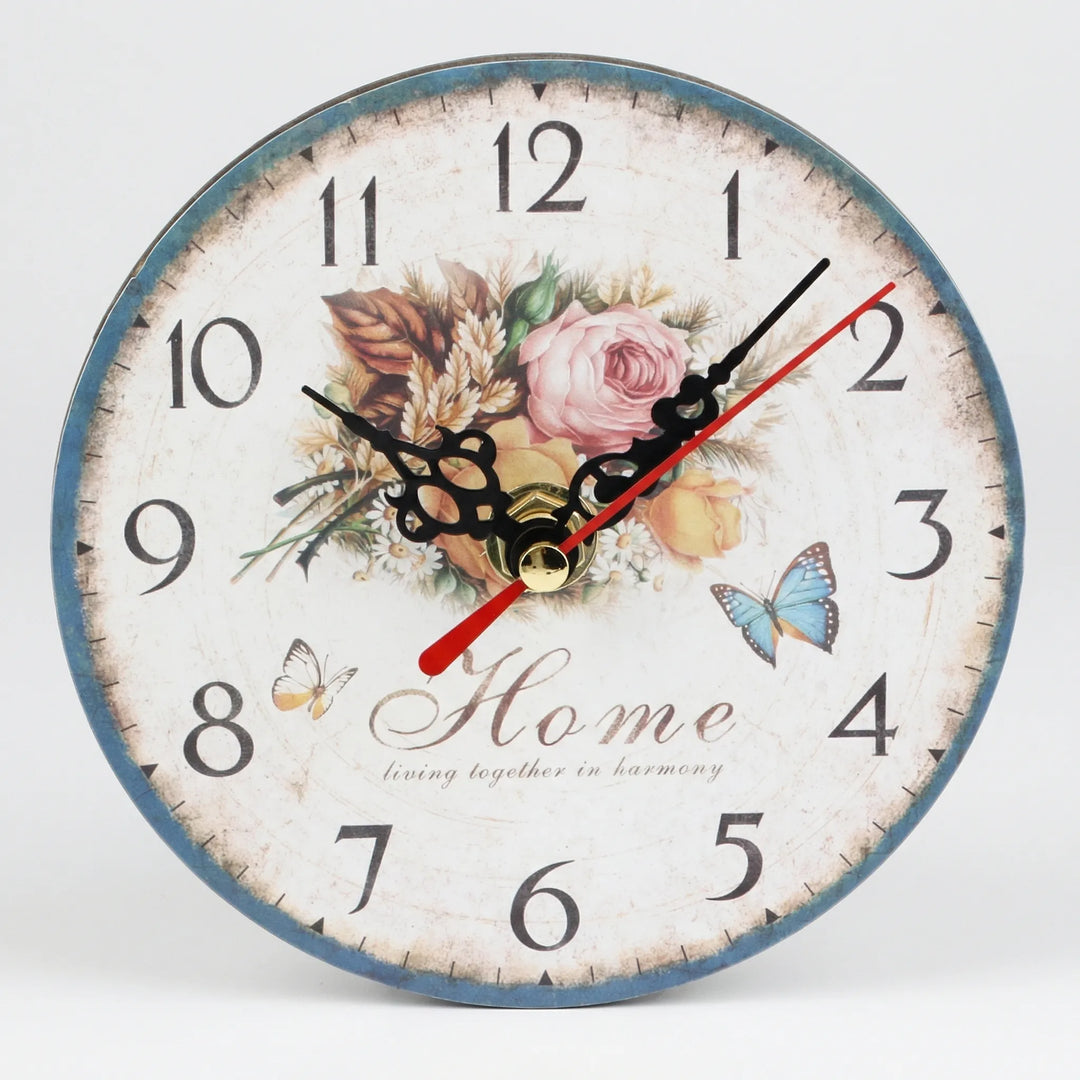 Decorative round wall clock featuring beautiful floral patterns. Perfect silent clock for elegant home decor.