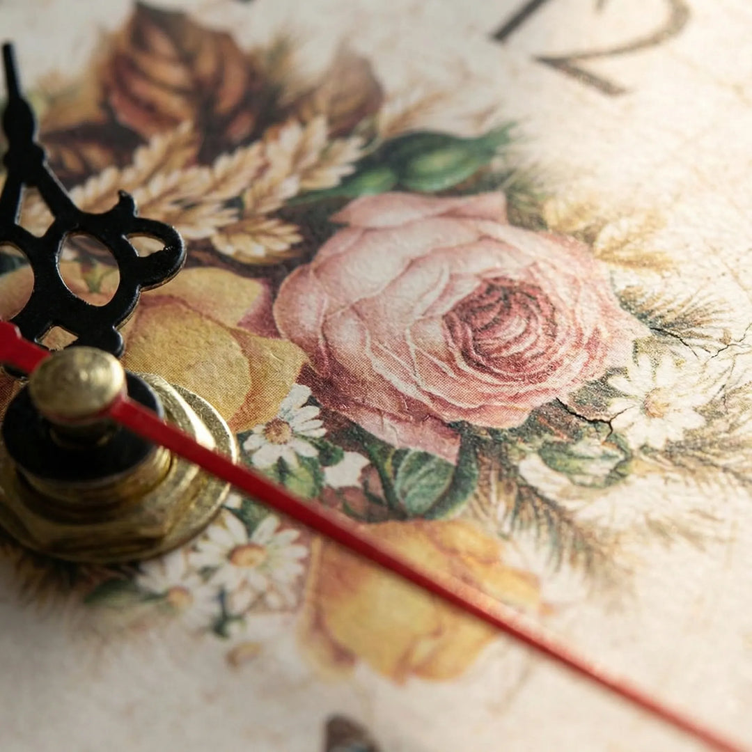 Vintage style floral wall clock, round shape with intricate butterfly details. Enhances any room decor.