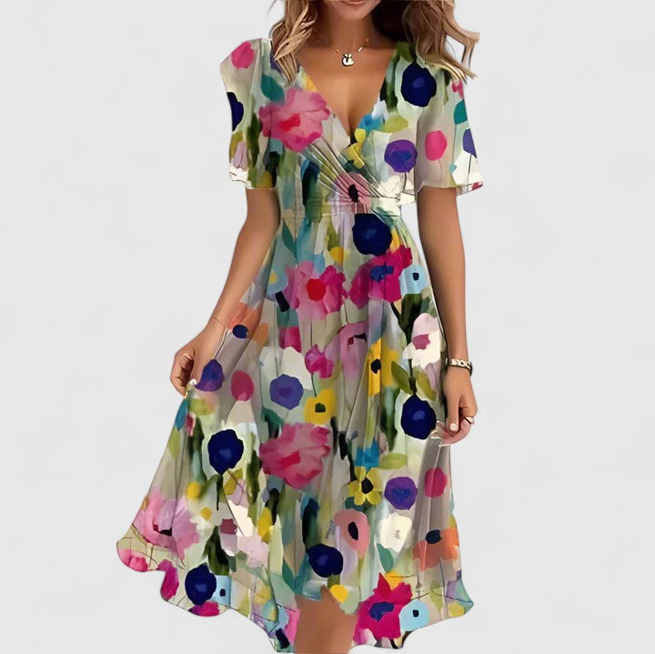 Women's versatile floral short dress with elegant flutter sleeves and stylish high-low hem.