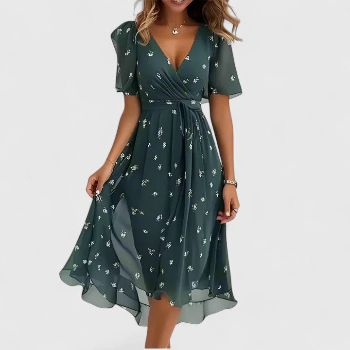 Versatile women's short floral dress, elegant design, V-neck, and flutter sleeves for any occasion.