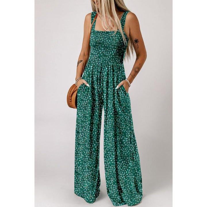 Women's versatile floral wide-leg jumpsuit, great for casual or elegant spring wear.