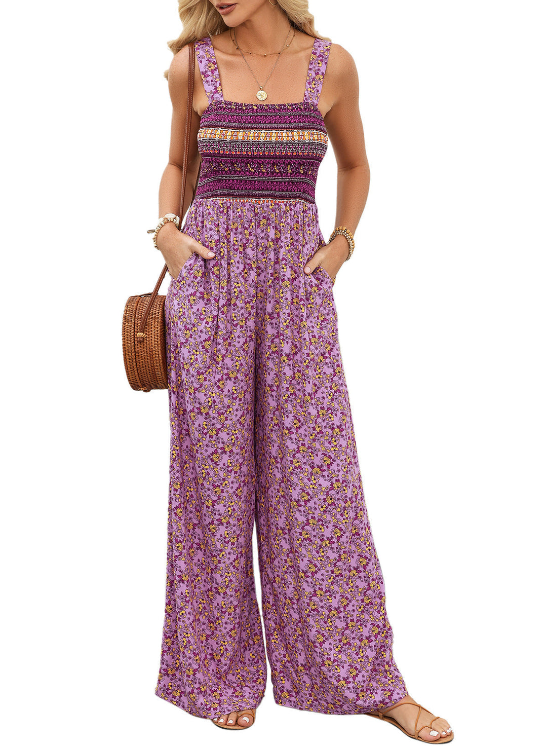 Back view of a woman wearing the elegant floral wide-leg jumpsuit for spring.