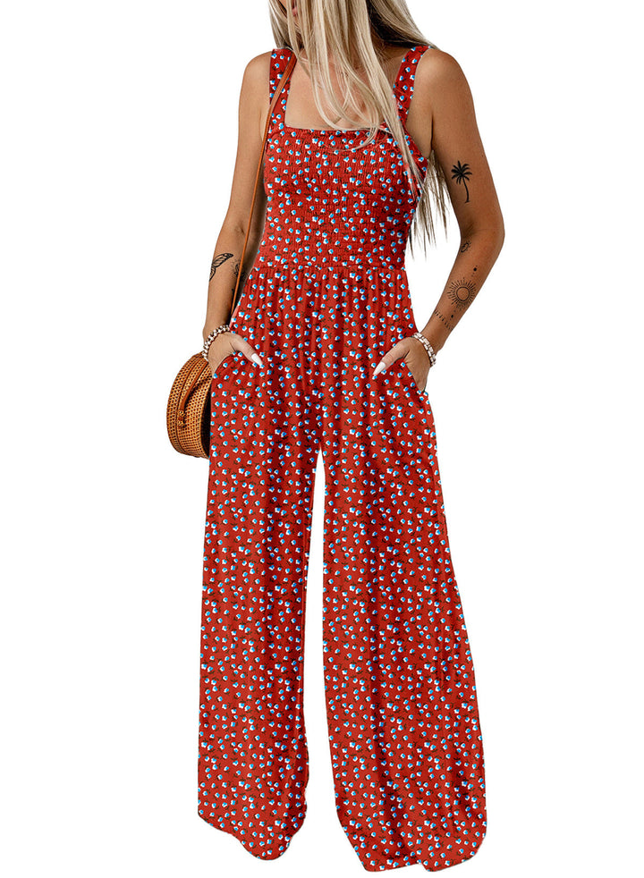 Model posing in a chic floral wide-leg jumpsuit, suitable for spring events.
