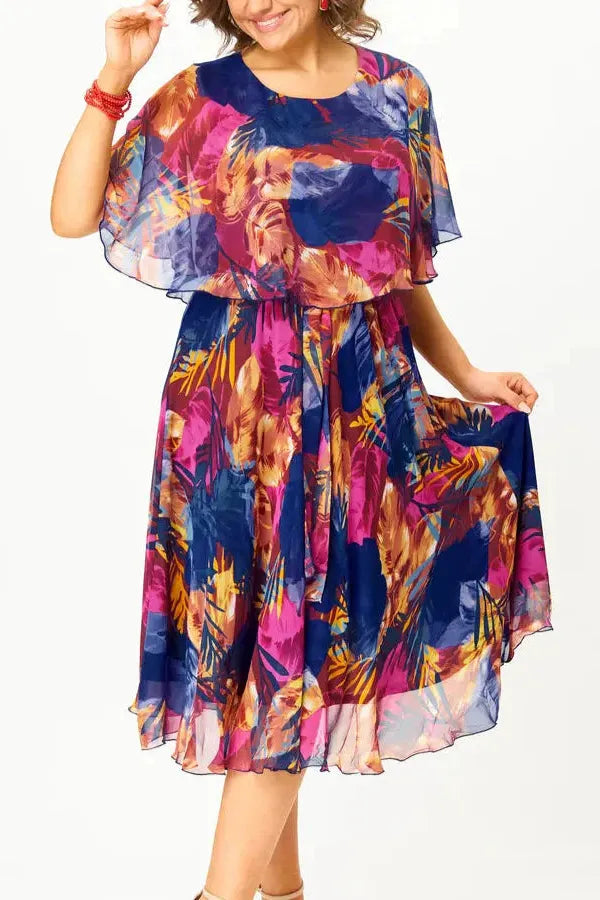 Elegant flowing midi dress for women, ideal for summer day-to-night events. Comfortable and stylish occasion wear.