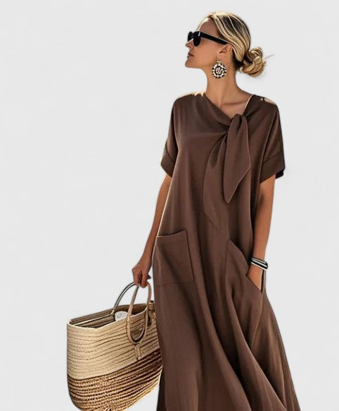 Elegant flowing summer dress for women, perfect for day-to-night style and comfort.