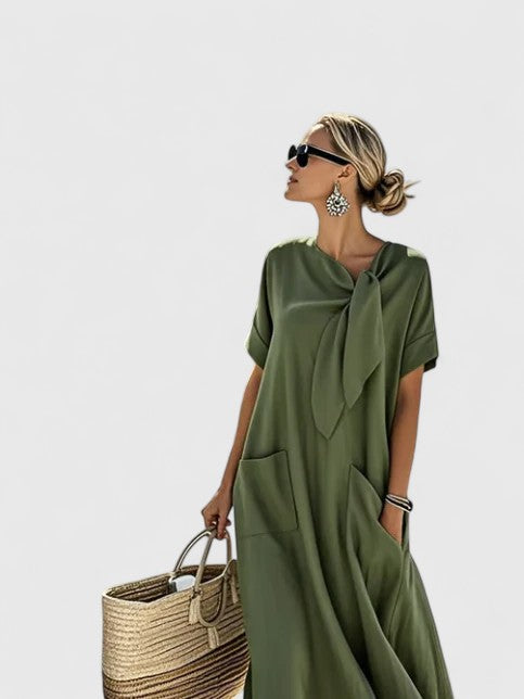 Versatile women's elegant flowing summer dress, designed for comfort and style from day to night.