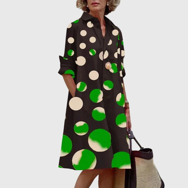 Side profile: Woman wearing a comfortable, elegant flowy dress with pockets. Versatile summer fashion choice.