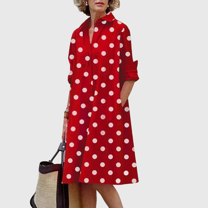 Soft, breathable fabric detail of an elegant flowy women's dress. Perfect comfortable summer casual wear.