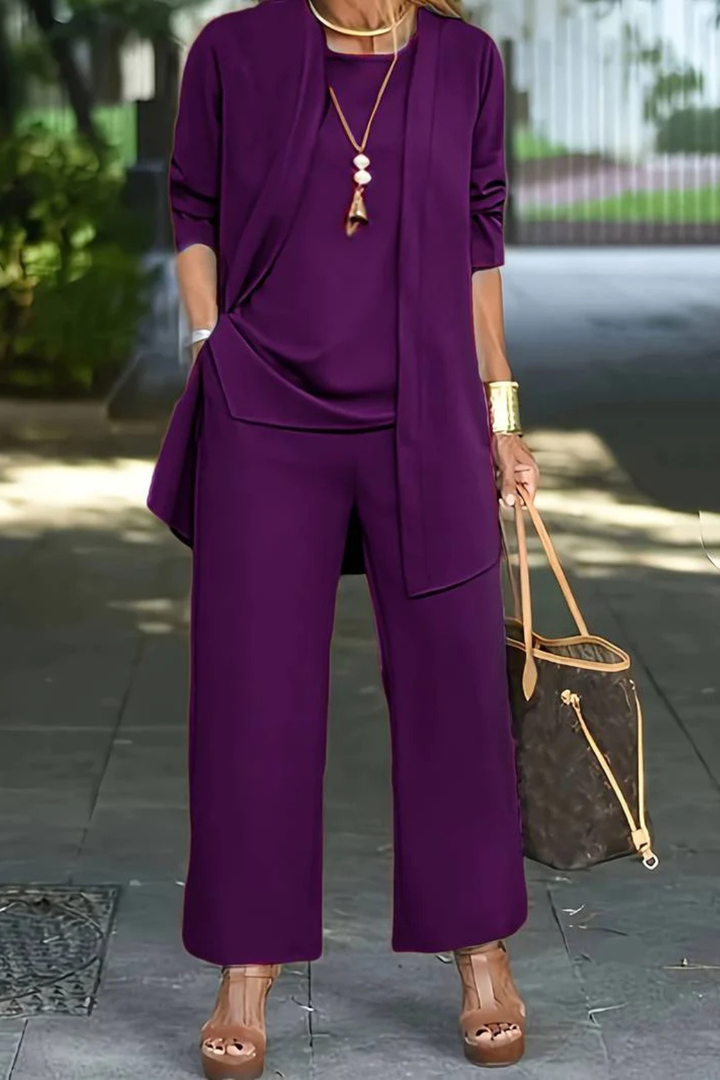 Elegant women's business suit set, featuring a tailored blazer, vest, and trousers for work.