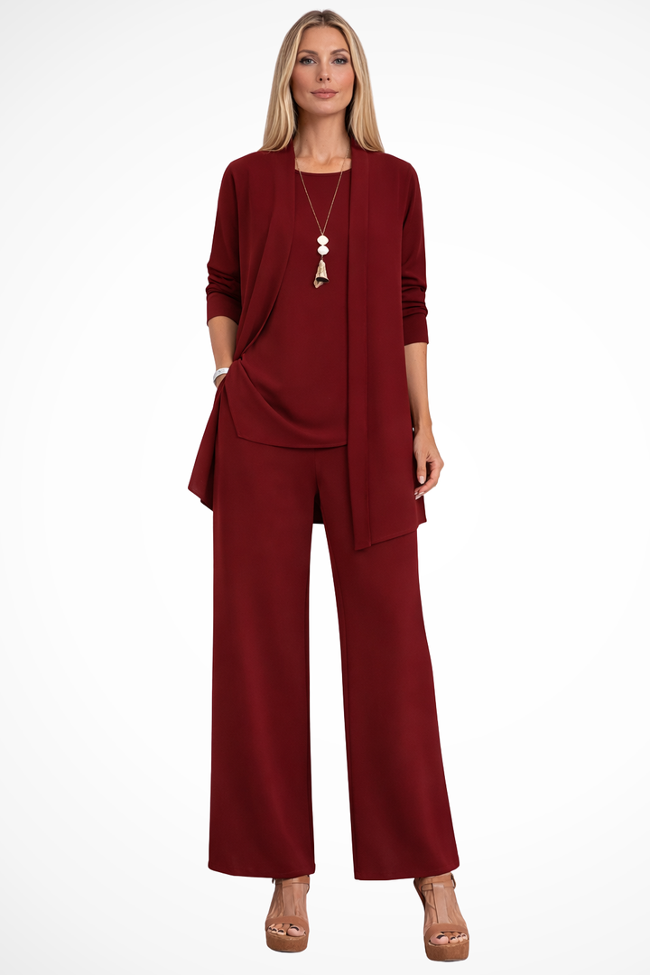 Women's elegant business suit: tailored blazer, vest, and trousers for a polished formal look.