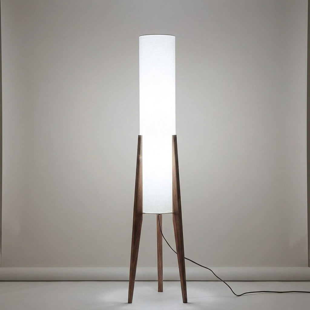 Cozy living room illuminated by a modern LED floor lamp. Scandinavian style, warm ambient light, walnut finish.