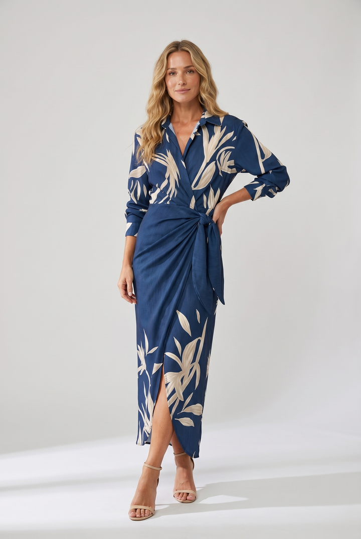 Women's flowy long sleeve V-neck maxi dress, featuring elegant leaf print and side slit.