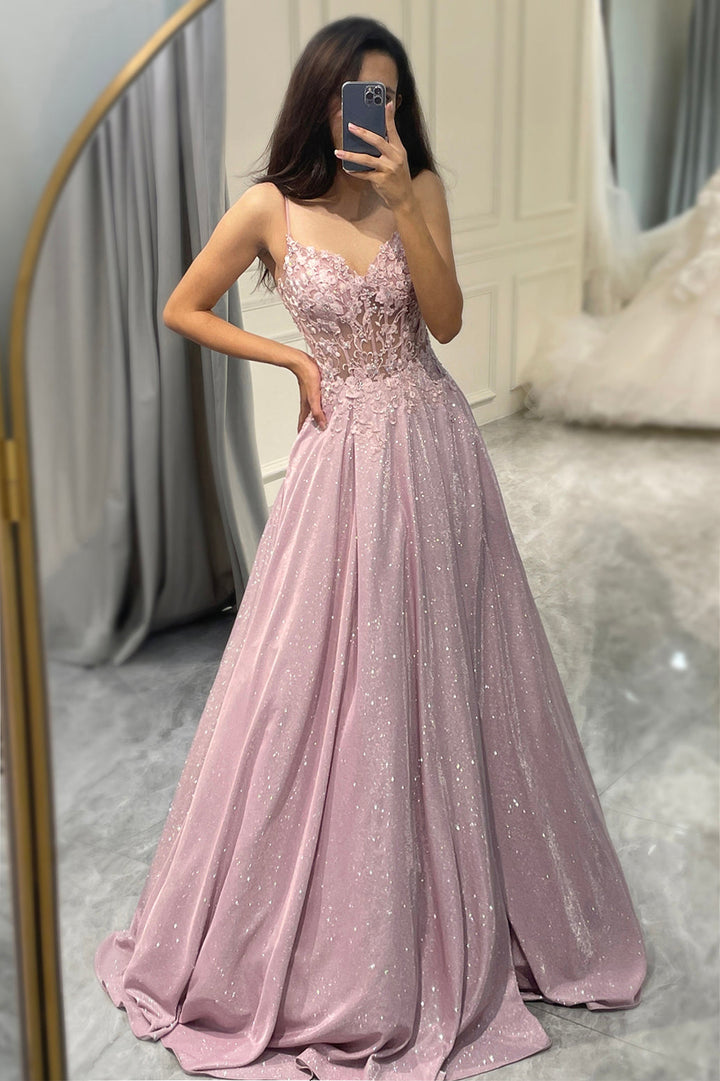 Embellished evening maxi dress in light pink, designed for women attending a wedding or special occasion.