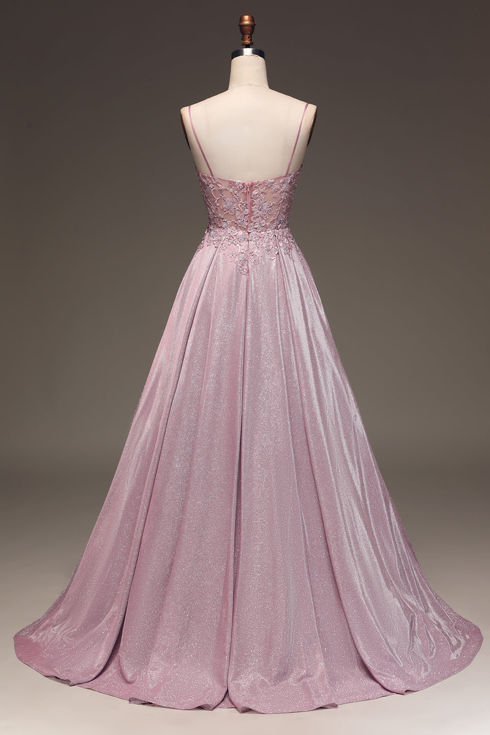 Light pink embellished formal dress for women, a beautiful and elegant option for wedding guests.