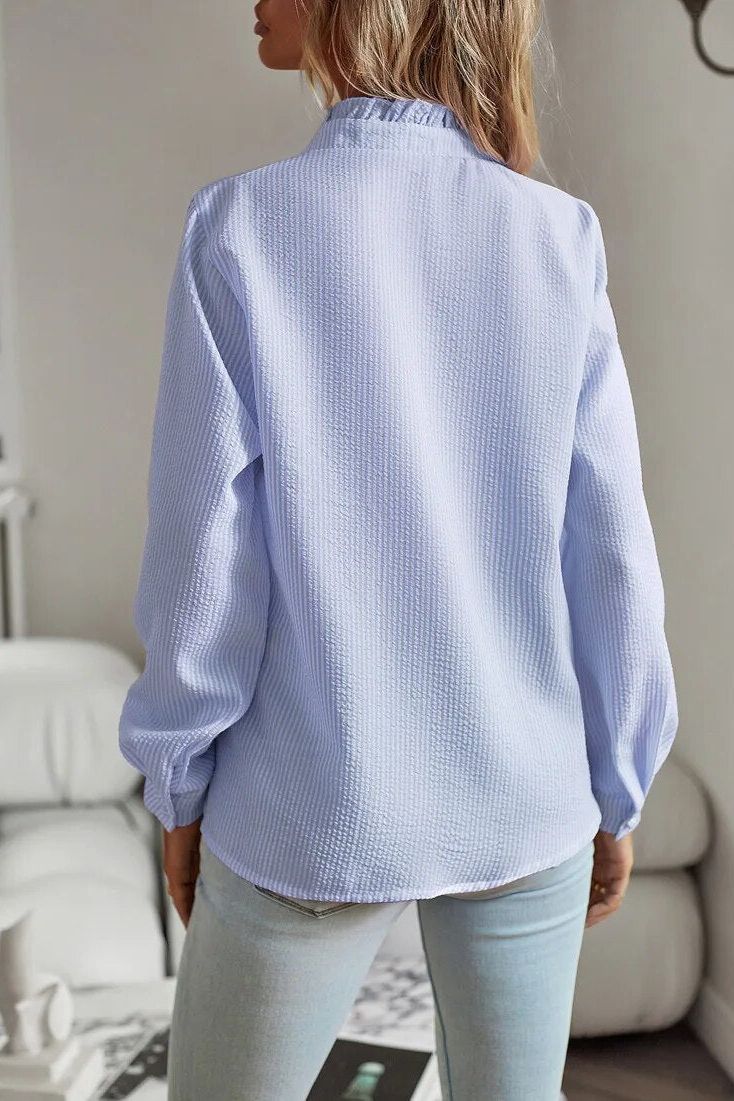 Women's versatile long sleeve top, ideal for office and casual chic outfits. Elegant and comfortable.