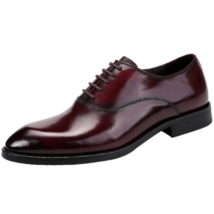 Professional men's formal Oxford dress shoes in polished leather. Perfect for business, weddings, and special occasion footwear.