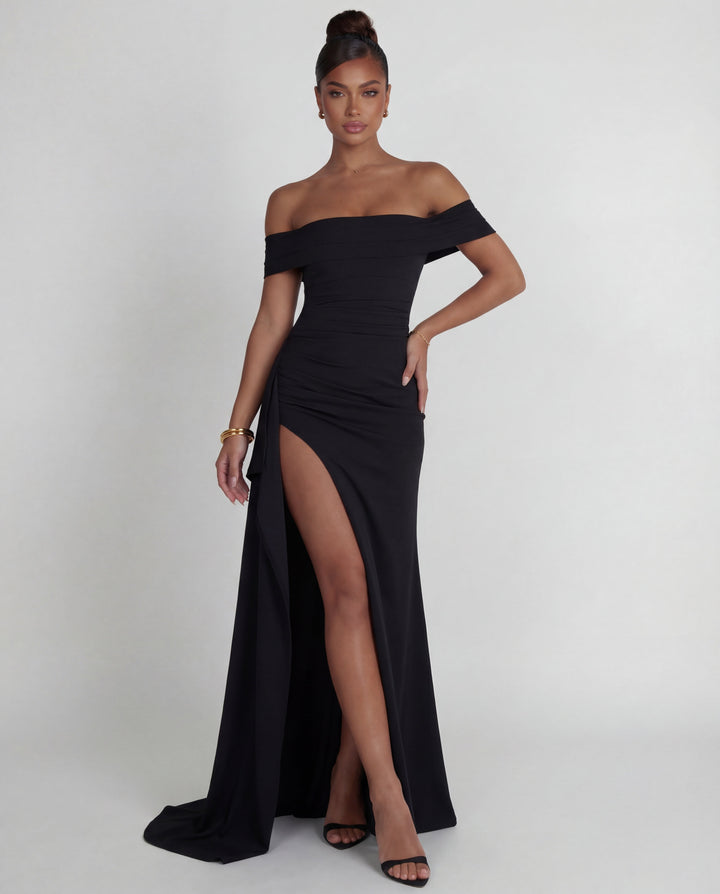 Full-length view of a gorgeous off-shoulder ruched bodycon maxi dress, ideal women's formal wear.