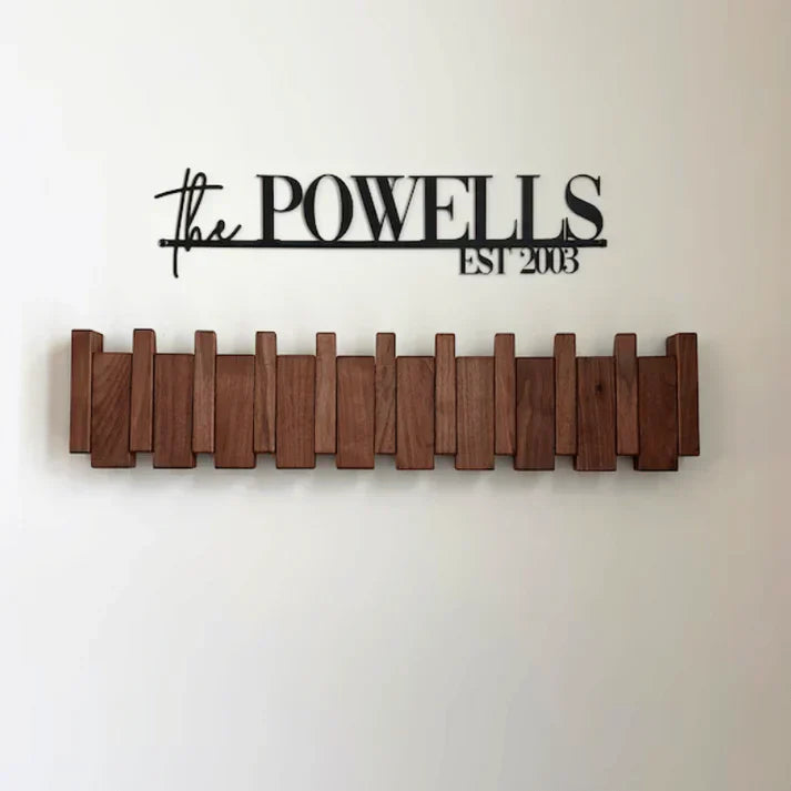 Space-saving piano key design coat rack, perfect functional decor for entryways.