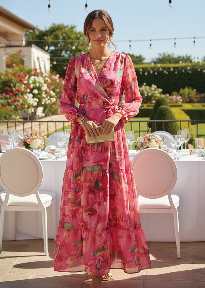 Elegant pink floral wrap maxi dress for women, perfect for summer parties or wedding guests. Flowy and stylish.