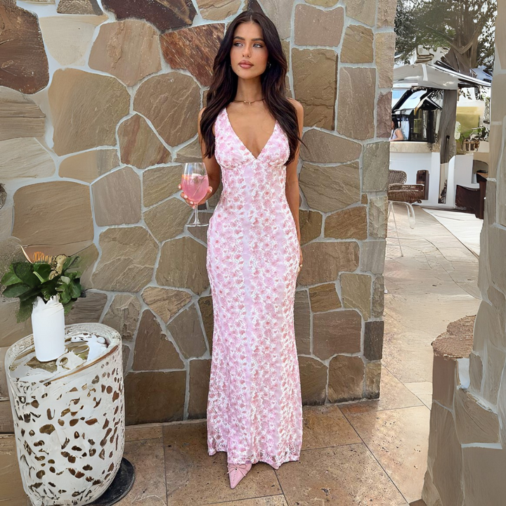 Women's formal pink maxi dress with flowing silhouette, ideal for elegant events