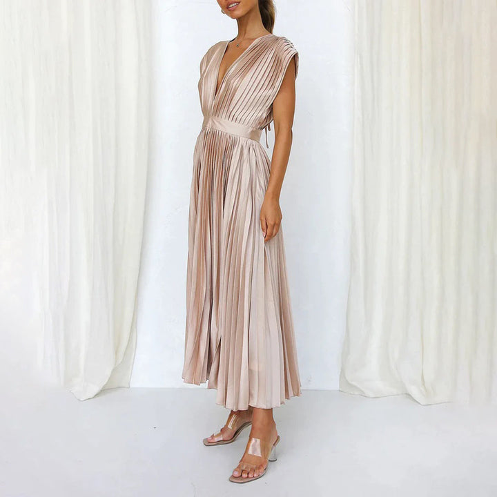 Sophisticated women's V-neck midi wedding guest dress with elegant pleating detail.