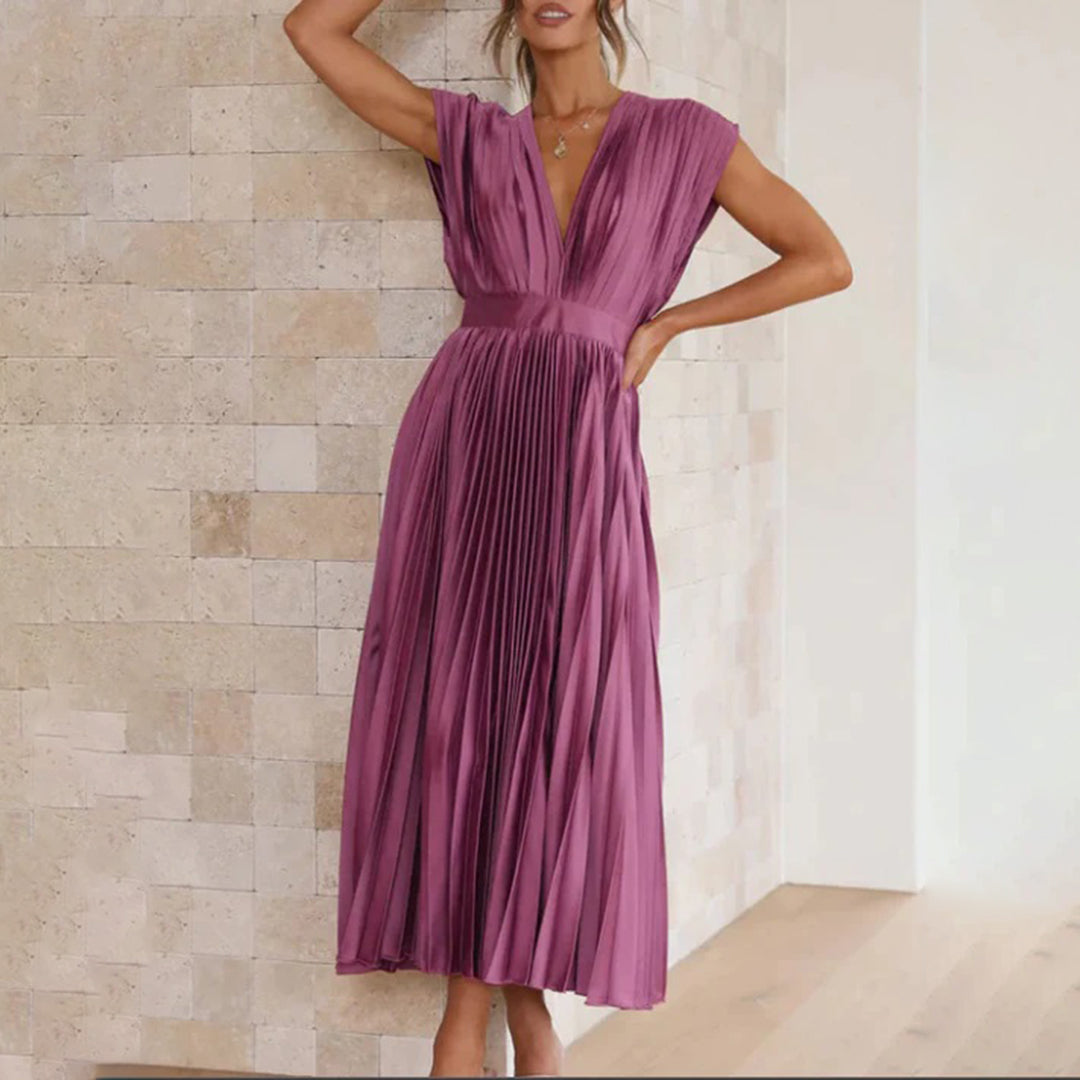Women's elegant spring formal dress, a V-neck pleated midi perfect for wedding guests.