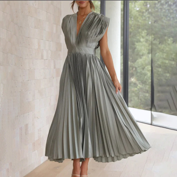 Pleated V-neck cocktail dress for women, a sophisticated midi style for evening wear.