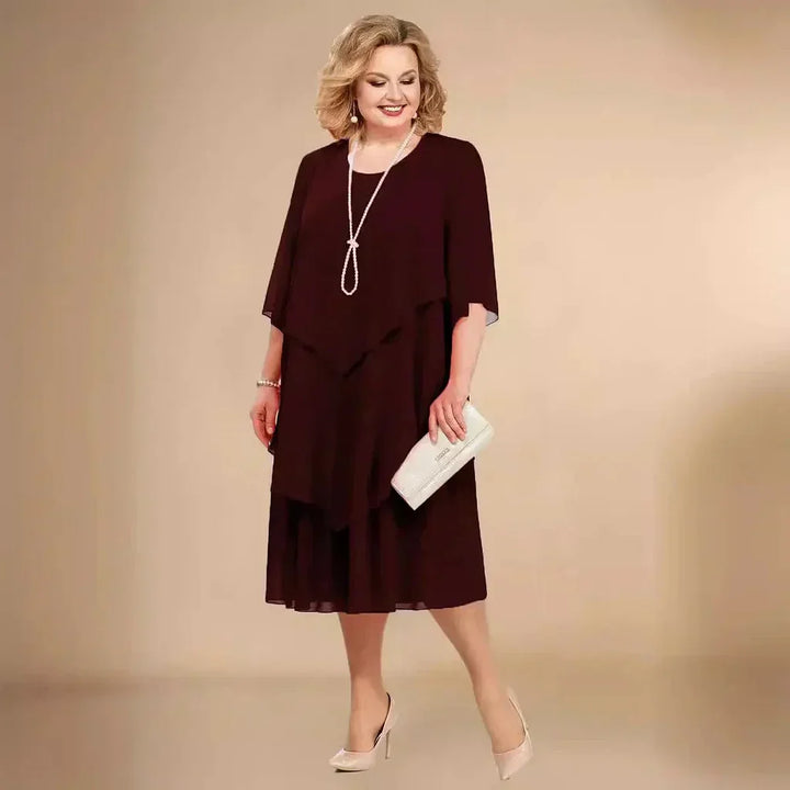 Chic plus size asymmetrical midi dress, ideal for women's formal events. Elegant design for parties.