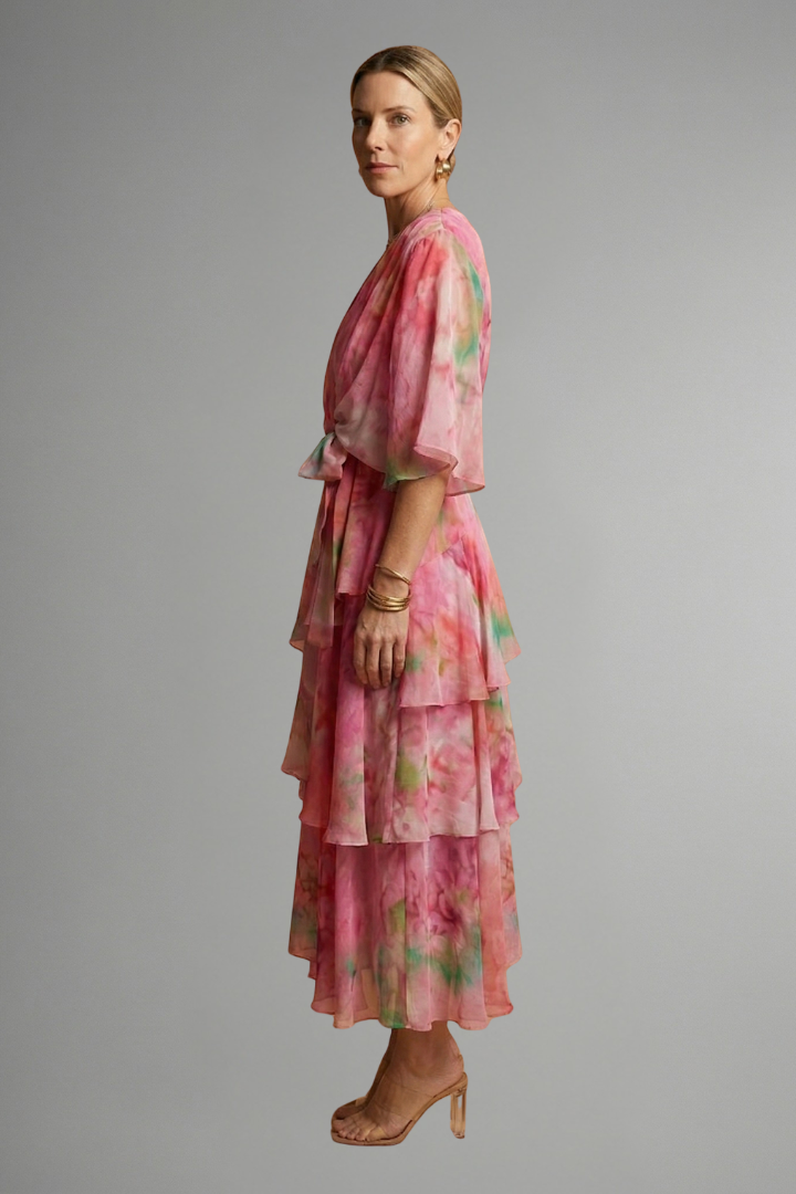 Women's elegant V-neck maxi dress, flowing printed skirt. Versatile for summer, casual, or evening wear.