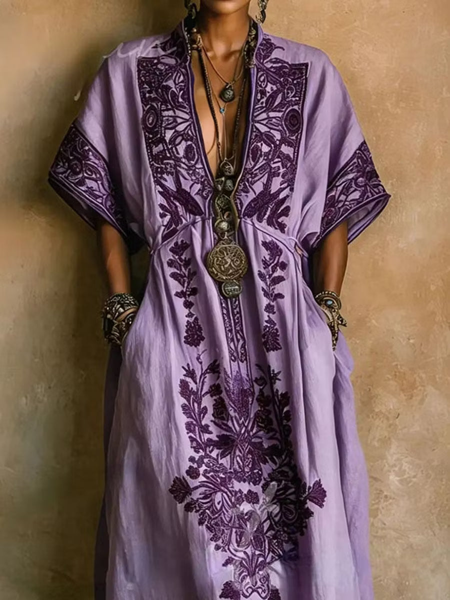 Flowing purple boho kaftan maxi dress with delicate embroidery, ideal for beach, resort, or evening wear.