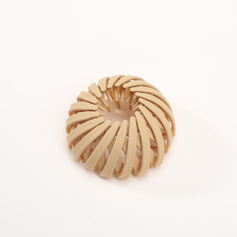 Versatile hairpin for women's hair, a bun maker that offers a quick and elegant styling option