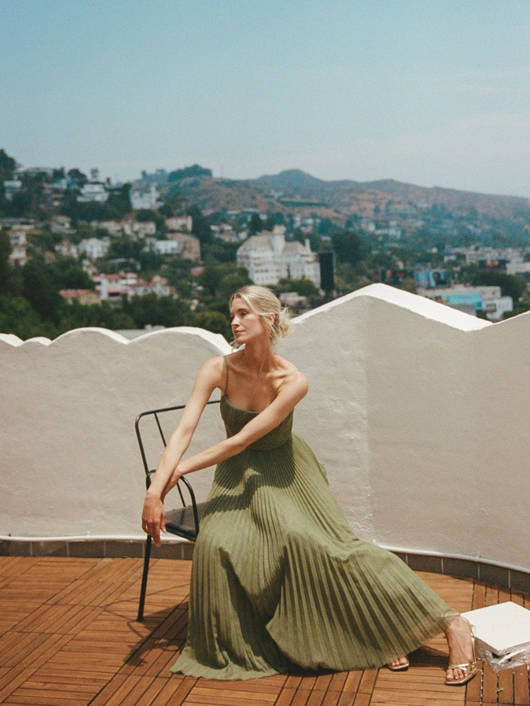 Sage green corset pleated maxi dress, a sophisticated choice for any formal summer event.