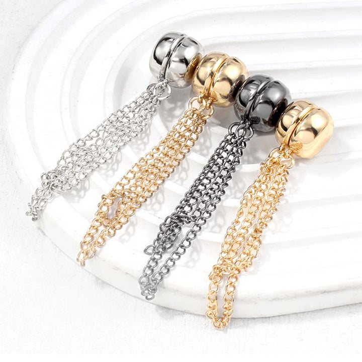 Close-up of a women's clothing clip attached to denim, demonstrating its ability to tailor casual outfits.