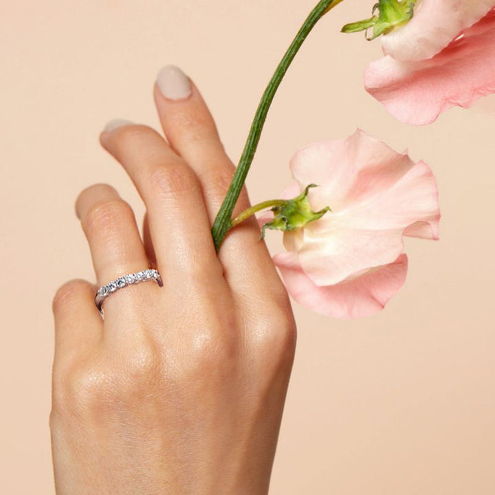 Gift-ready women's silver zircon ring, presented in a jewelry box for a special occasion.
