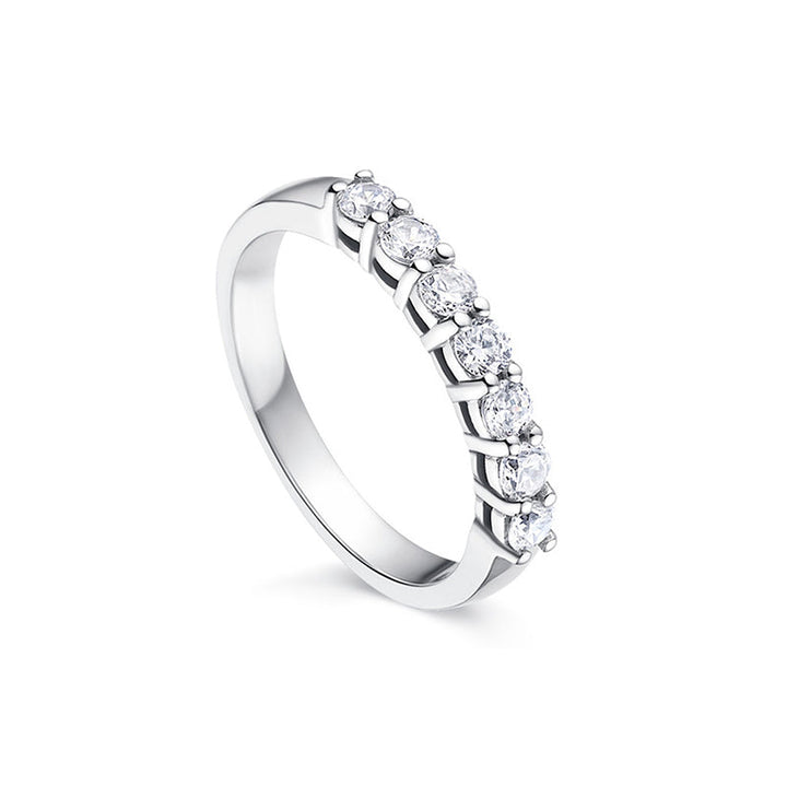 Elegant silver ring with seven fiery zircon stones, a stunning addition to any jewelry collection.