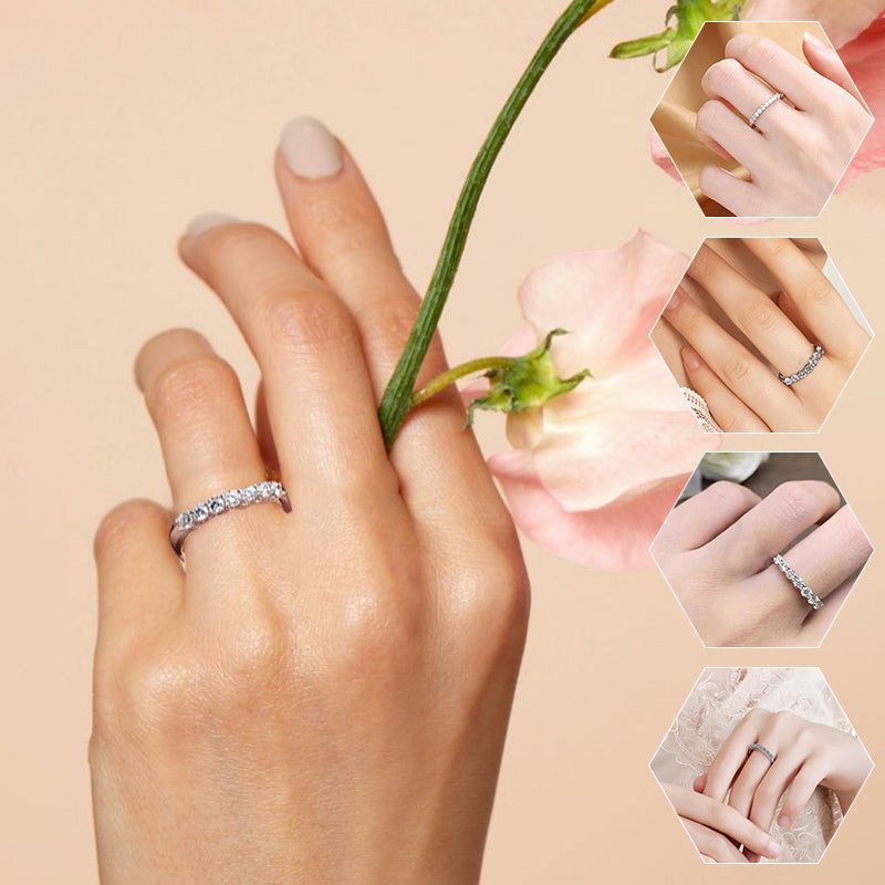 Women's elegant zircon ring on a hand, showcasing its sparkle and classic design.