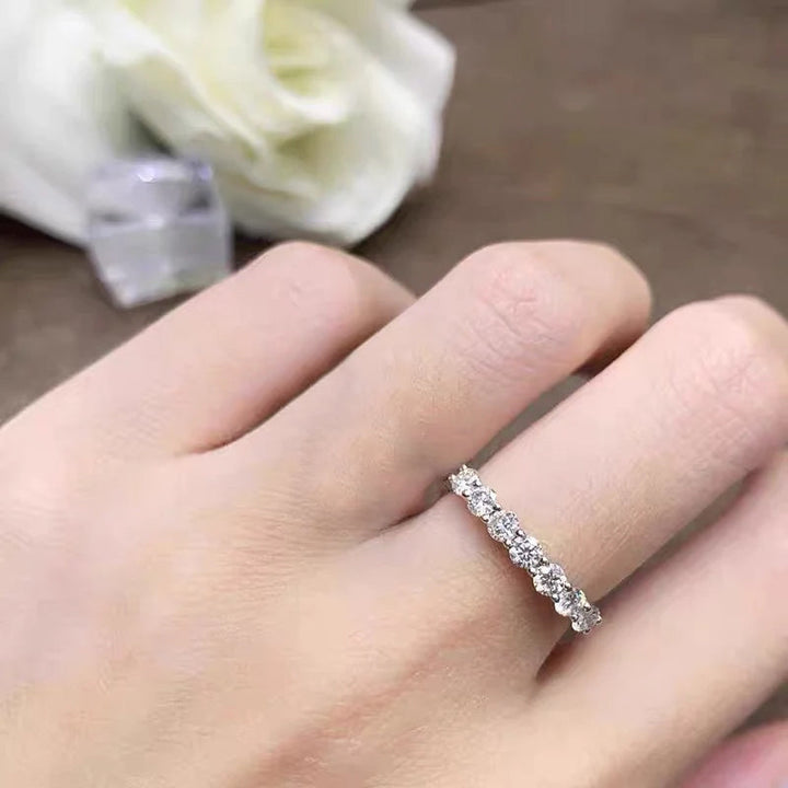 Zircon anniversary ring for women, highlighting its elegant design and silver band.