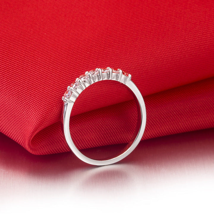 Classic women's fashion ring with seven zircon stones, suitable for any elegant outfit.