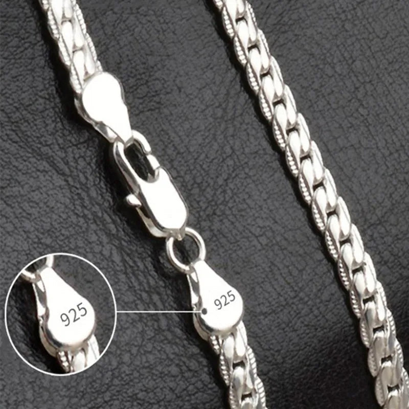 Elegant silver-tone lucky charm pendant necklace for women. Dainty fashion accessory, perfect for everyday or special occasions.