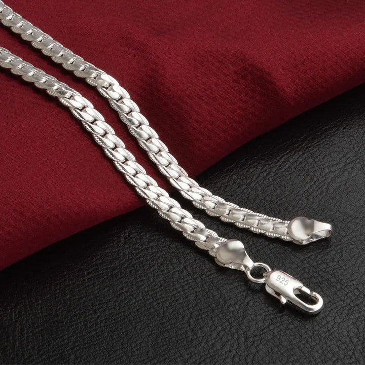 Women's silver lucky charm necklace. Elegant pendant jewelry, a perfect gift for her, adding a touch of fortune.