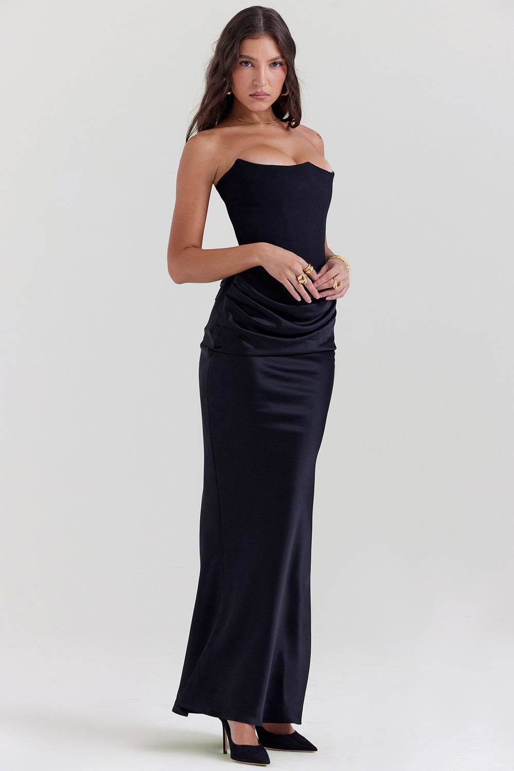 Women's black strapless maxi dress, a sophisticated choice for wedding guests and formal occasions.