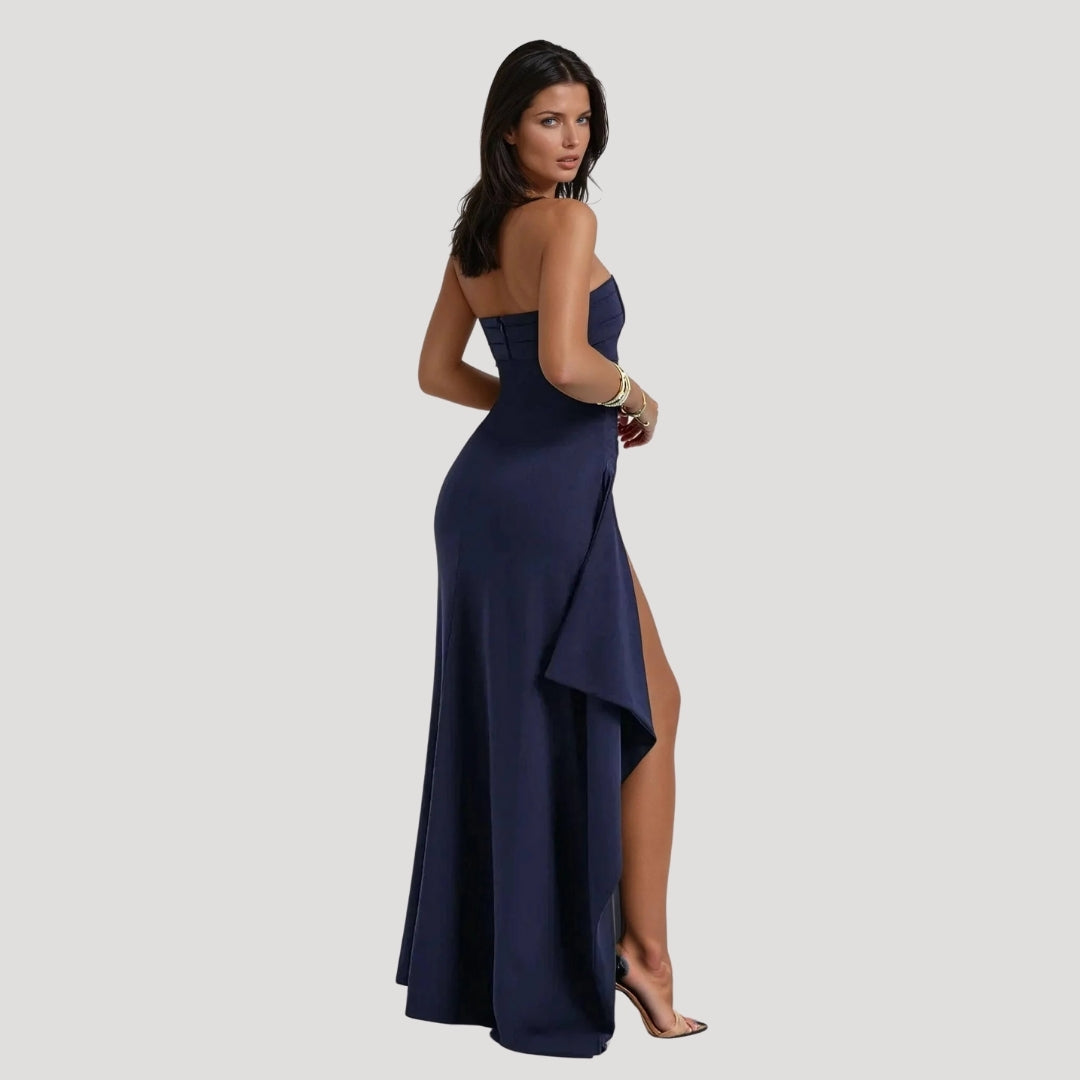 Soft green strapless maxi dress for women, an elegant choice for wedding guests.